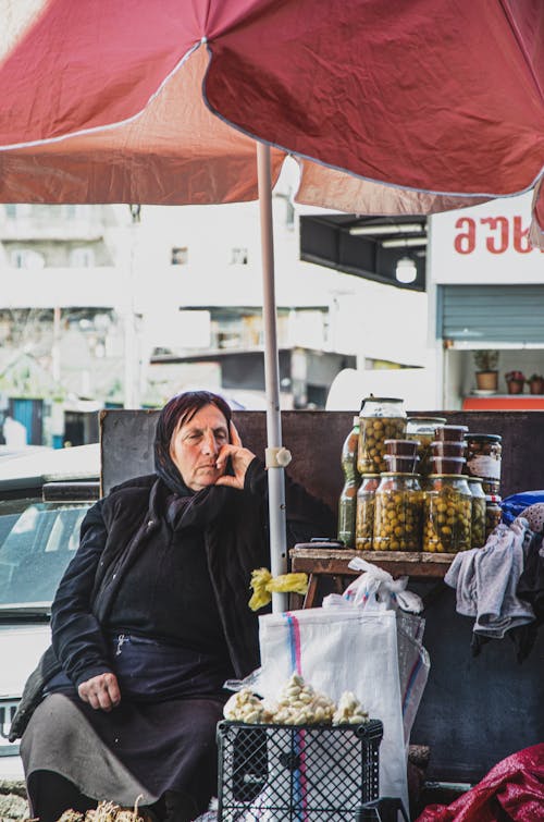 Woman Selling Food on a Street Market 