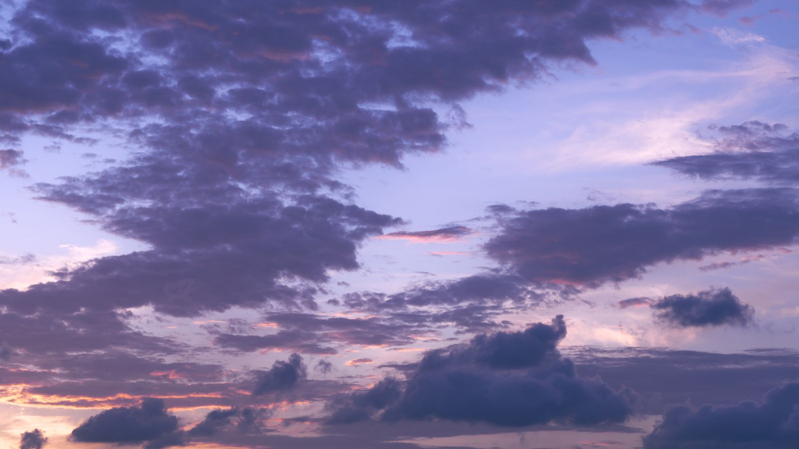 Purple and Pink Twilight Clouds dark MacBook wallpaper 4K
