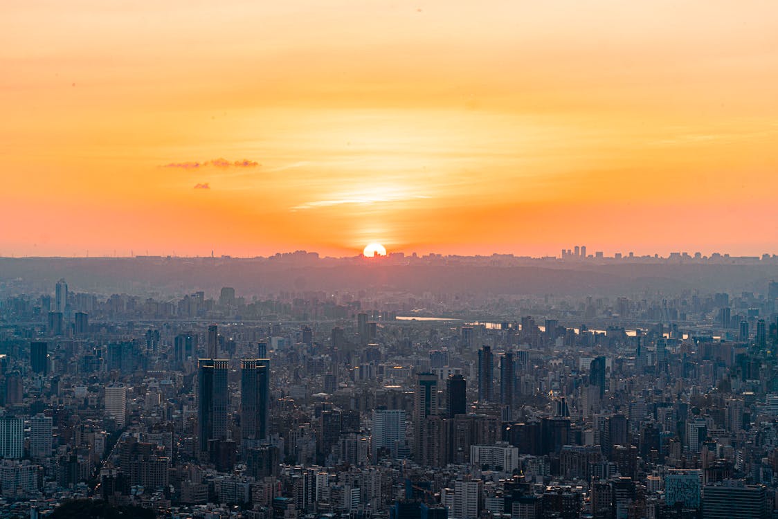 Aerial Photography of City Buildings During Sunset · Free Stock Photo