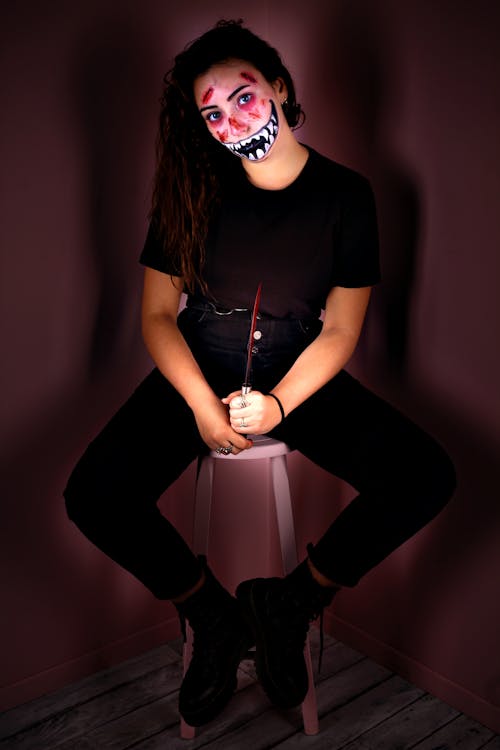 crepy smile girl with knife