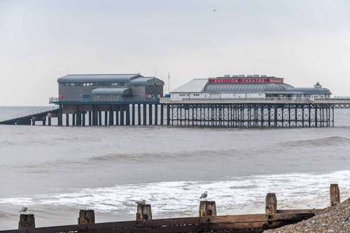 Buildings on Pier on Sea