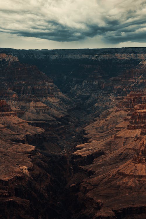 A Rocky Mountain Under Cloudy Sky