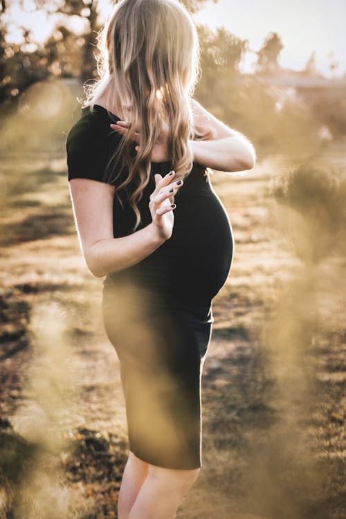 Pregnant Woman Wearing a Black Dress