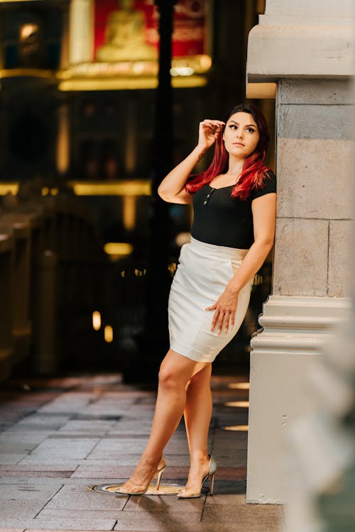 A Woman Leaning on a Wall