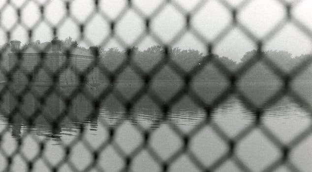 View on Water Through the Wire Fence in Central Park, NYC, 1979