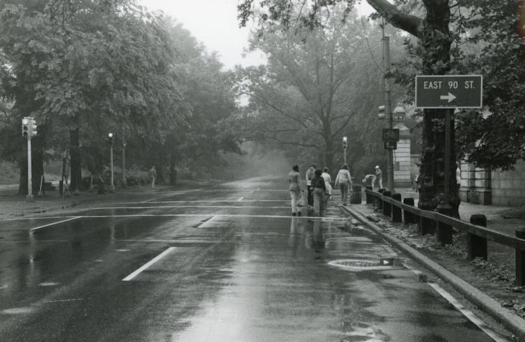 People On Empty Road After The Rain In Central Park At East 90th Street, NYC, 1979