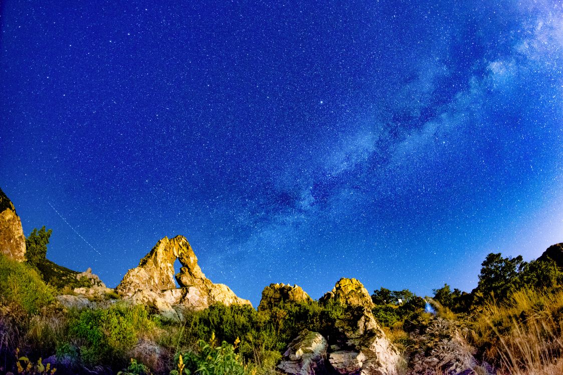 Sky Behind Rocks Rock Formations Under Starry Sky · Free Stock Photo