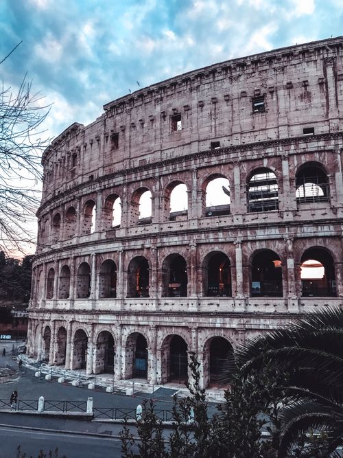 Free Explore the grandeur of the ancient Colosseum in Rome, a symbol of Roman architecture and history. Stock Photo
