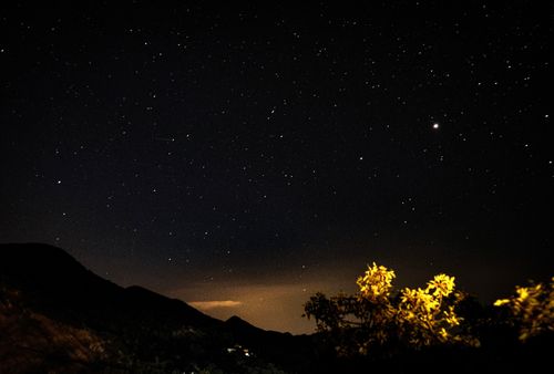 Free Beautiful starry night sky over the Tirana hills in Albania, showcasing serene celestial beauty. Stock Photo