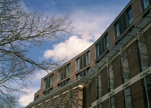 Brown Concrete Building Under Blue Sky