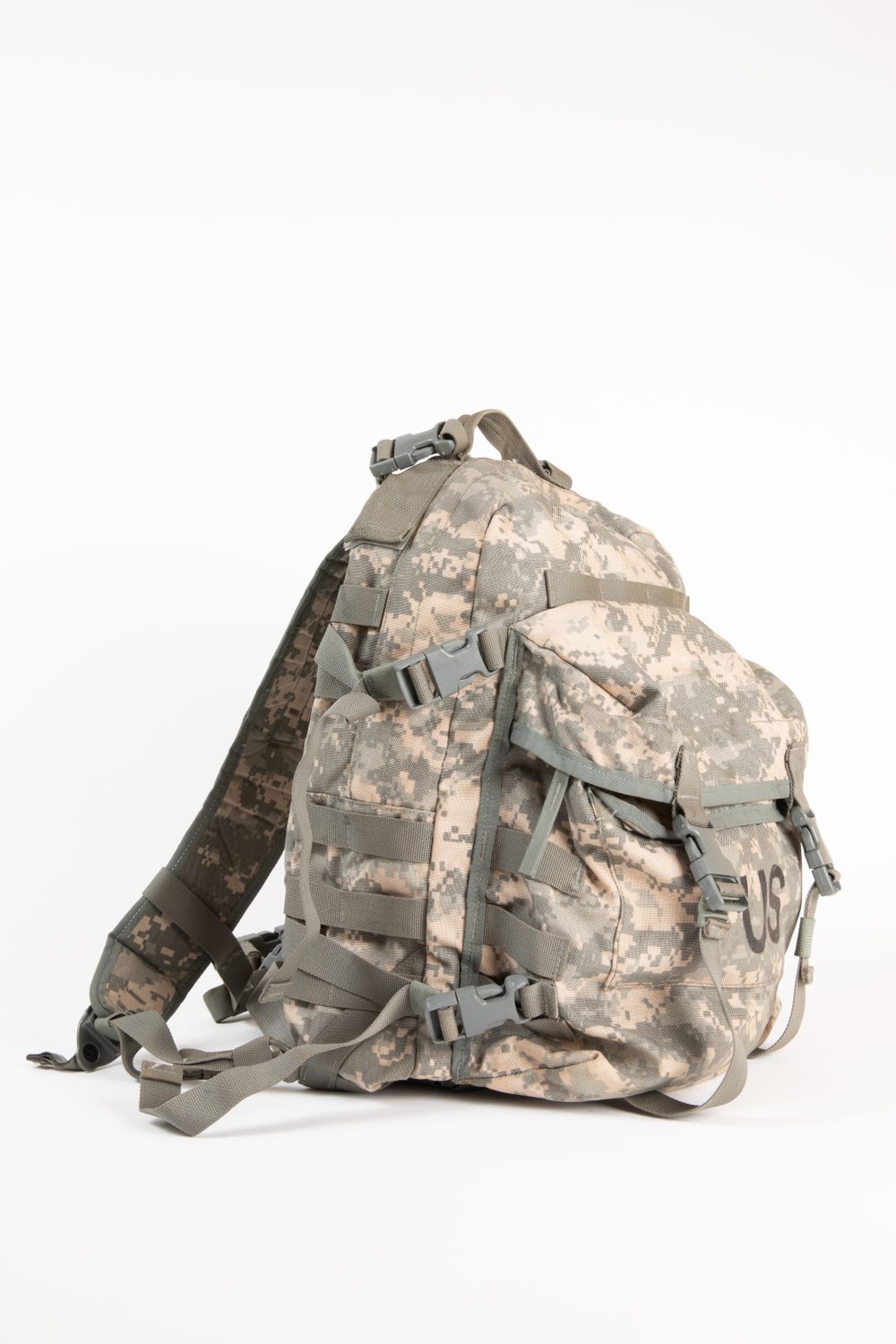 Military Backpack on White Surface · Free Stock Photo
