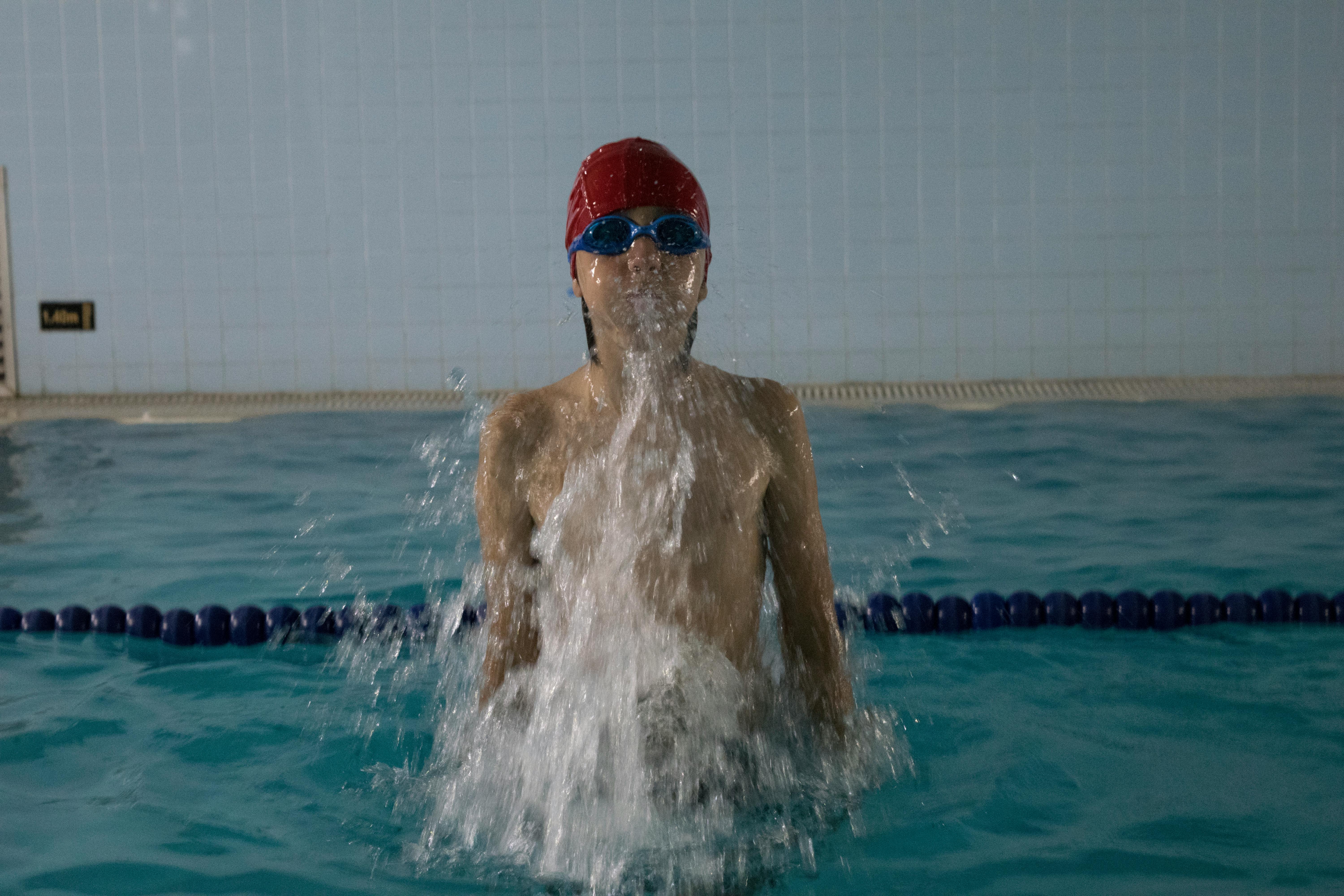 Free stock photo of indoor sport, indoor swimming pool, swimmer