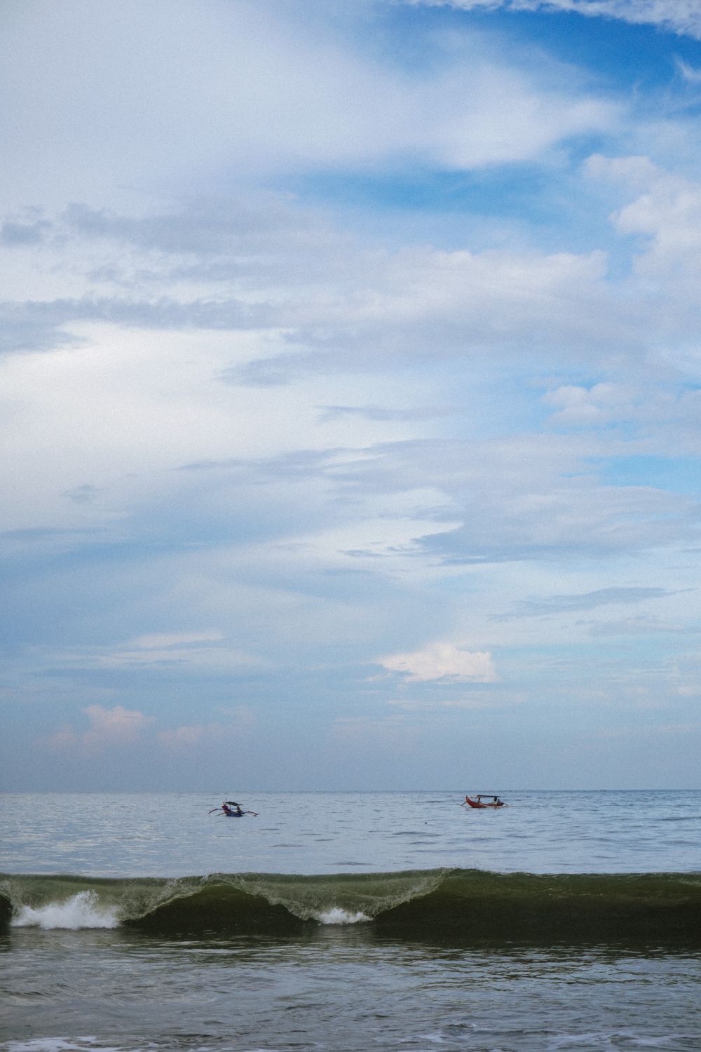 Sea Waves Under White Clouds and Blue Sky · Free Stock Photo