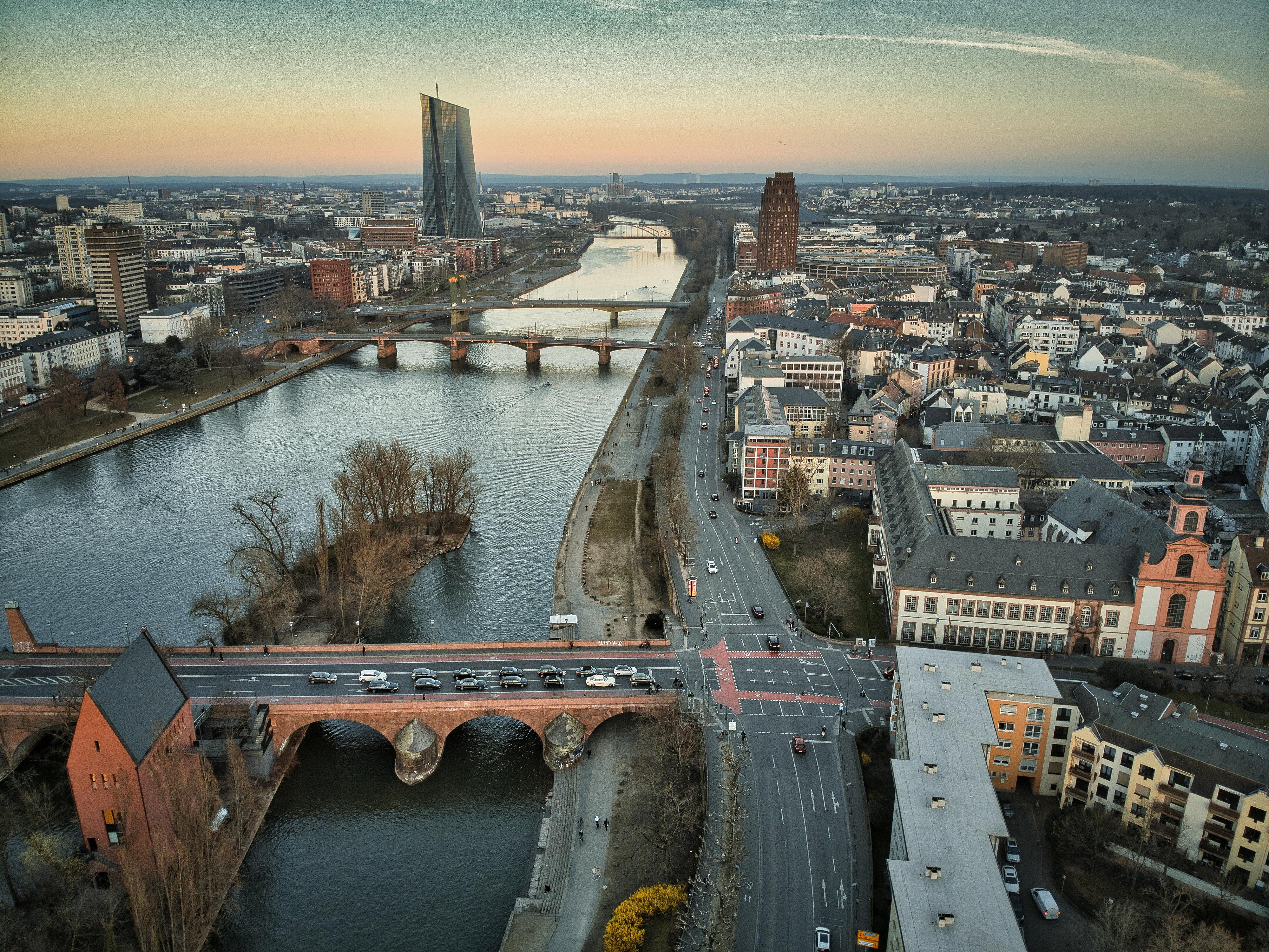 Scenic aerial view of Frankfurt am Main cityscape with iconic buildings and the Main River.