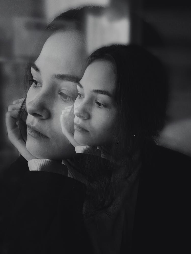 Double Exposure Photo Of Woman Resting Her Head On Her Hand