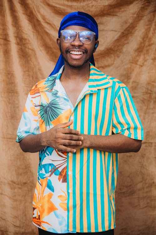 Man in Button Up Shirt Smiling