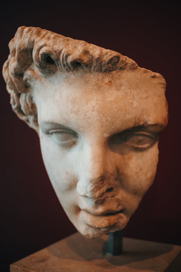 Chipped Face Of Roman Antique Statue