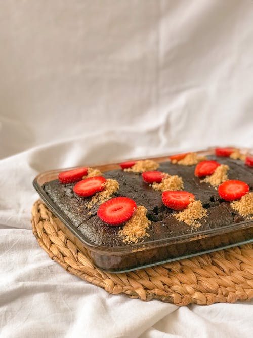 Free Chocolate Cake with Slices of Fruits on Top Stock Photo