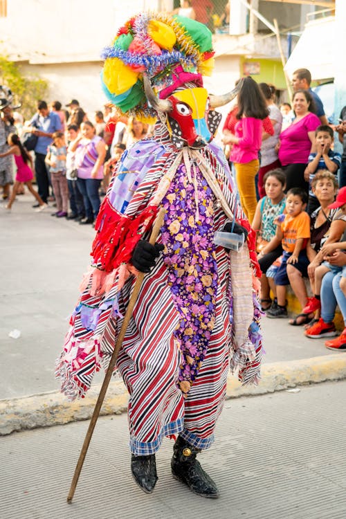 Person in Colorful Costume on Street