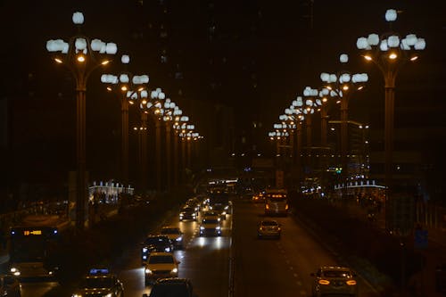 Photo of Cars on the Road at Night Time