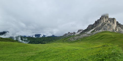 Clouds in the mountains landscape , beautiful nature background , green trees