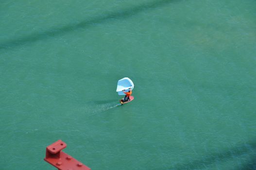 Aerial photo of a wingsurfer navigating the waters near San Francisco, USA.