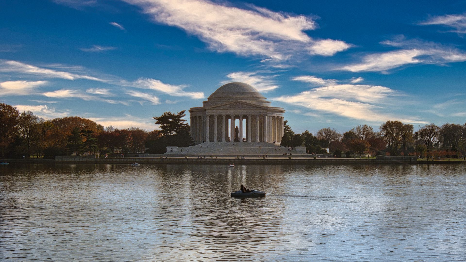 Scenic view of Jefferson Memorial across the Tidal Basin in Washington, D.C. during fall.