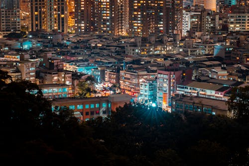 
An Aerial Shot of Buildings in a City at Night