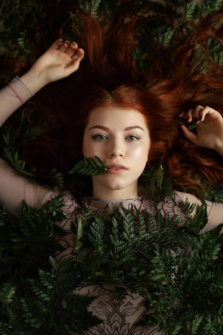 Woman Lying In Ferns