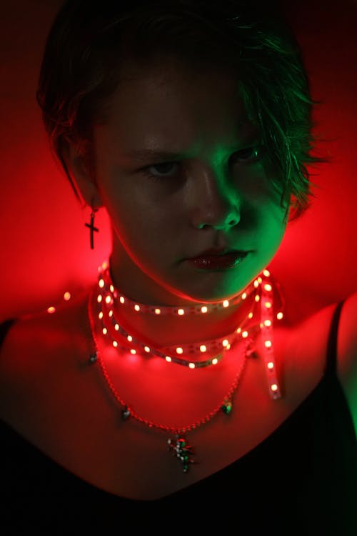 
A Woman with LED Light Strips around Her Neck
