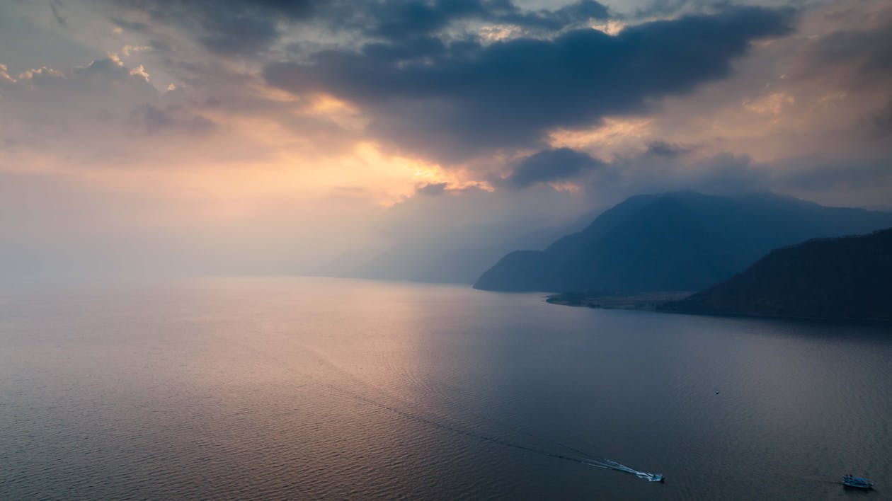 Body of Water Near Mountain