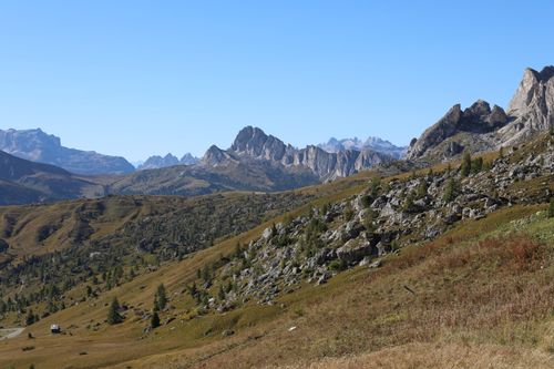 Free Scenic view of the Dolomites mountains in Veneto, Italy, under a clear blue sky. Stock Photo