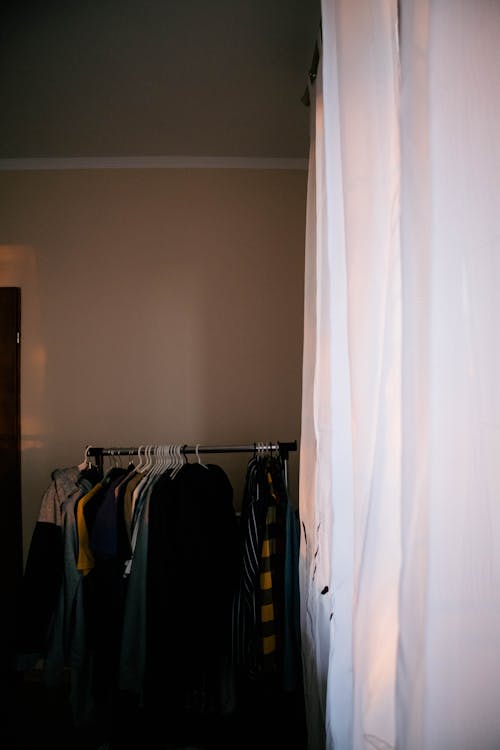 Free Clothes Hanging on a Clothes Rack Stock Photo