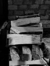 Grayscale Photo of Wood Logs