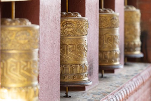 Free Buddhist Prayer Wheels in a Temple Stock Photo