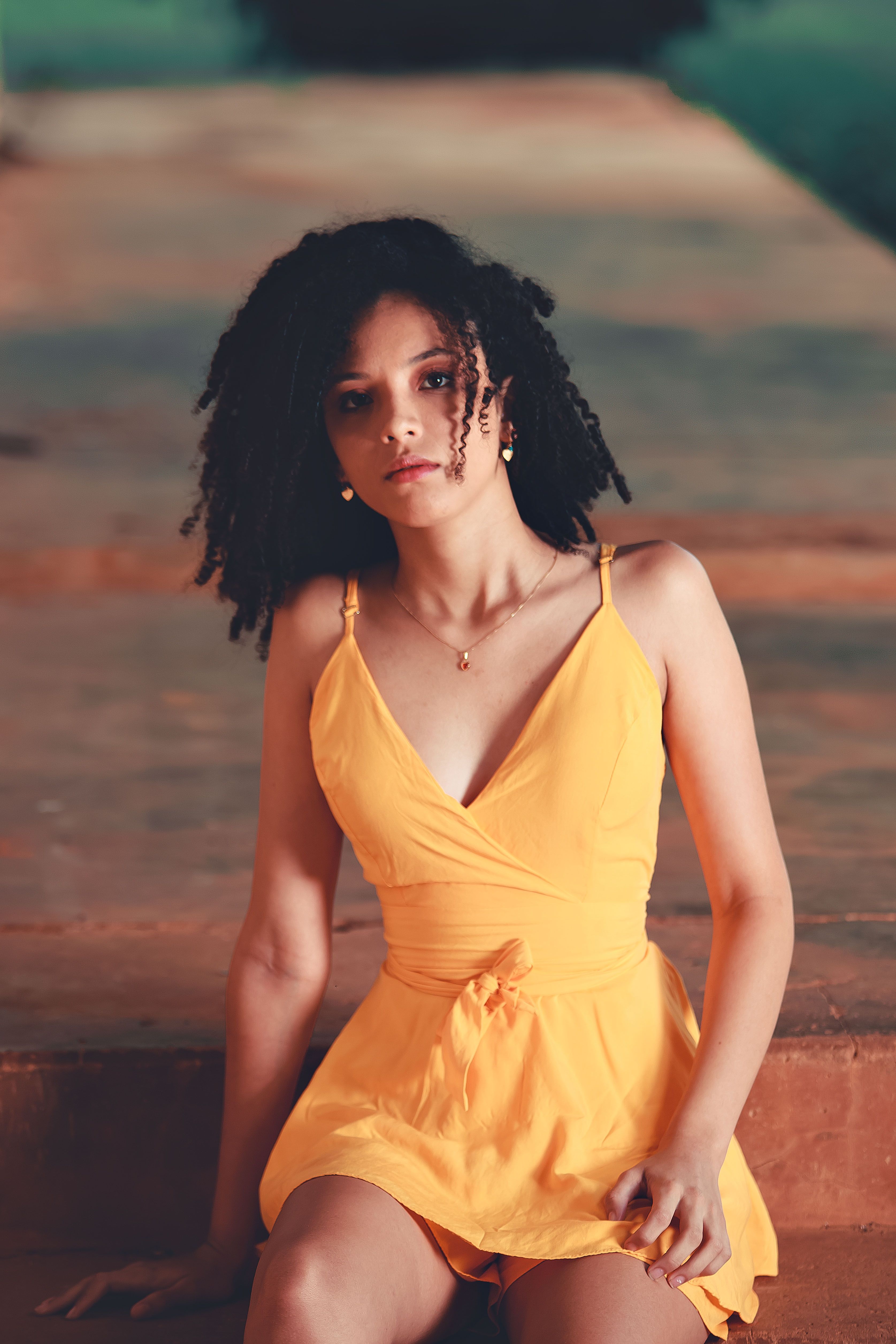 A Woman Sitting on the Ground · Free Stock Photo