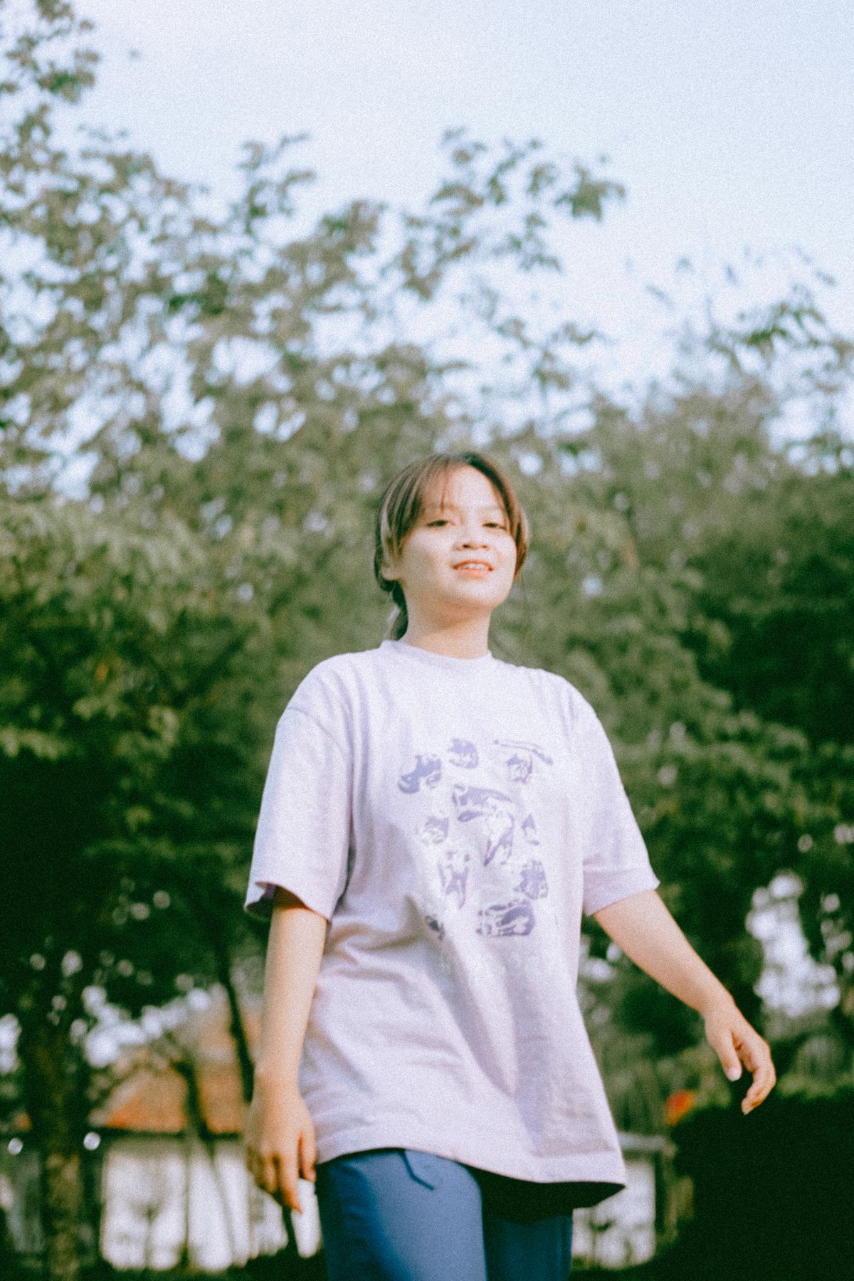 Woman wearing a custom-printed lilac T-shirt