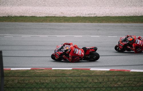 Free Thrilling motorcycle race showcasing speed and skill at Sepang International Circuit, Malaysia. Stock Photo
