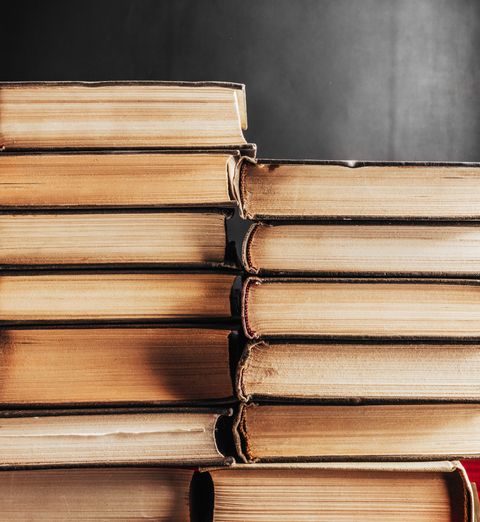 Stack of old hardcover books