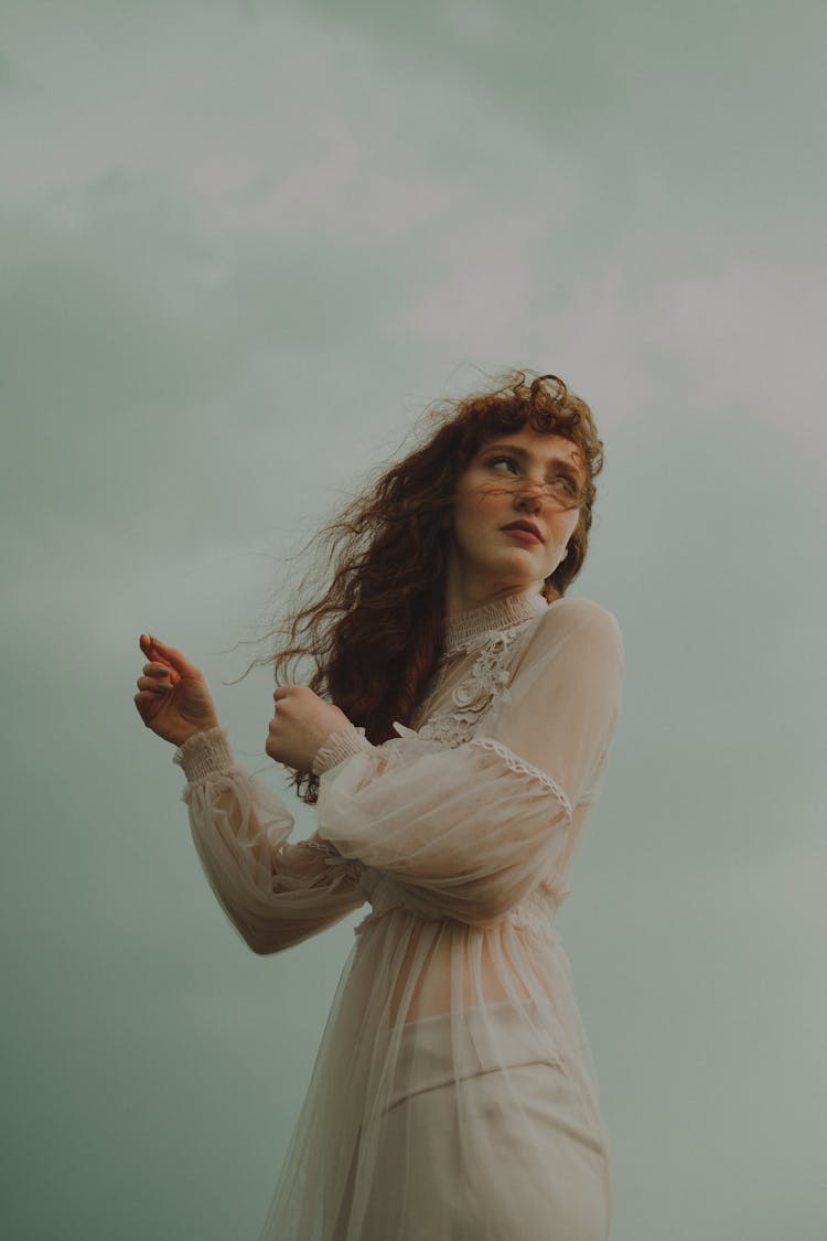 Redhead Woman In White Boho Dress