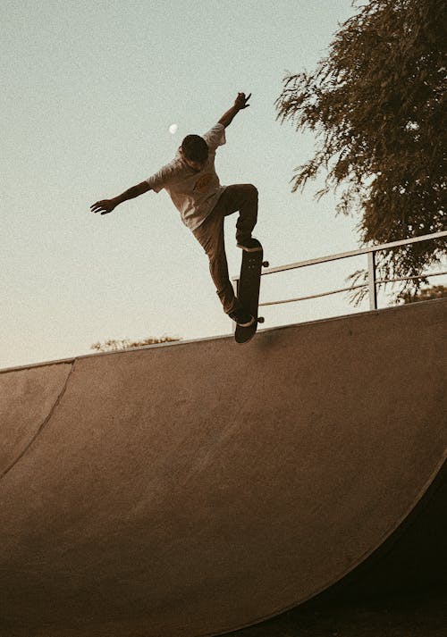 Photo of a Man Skateboarding