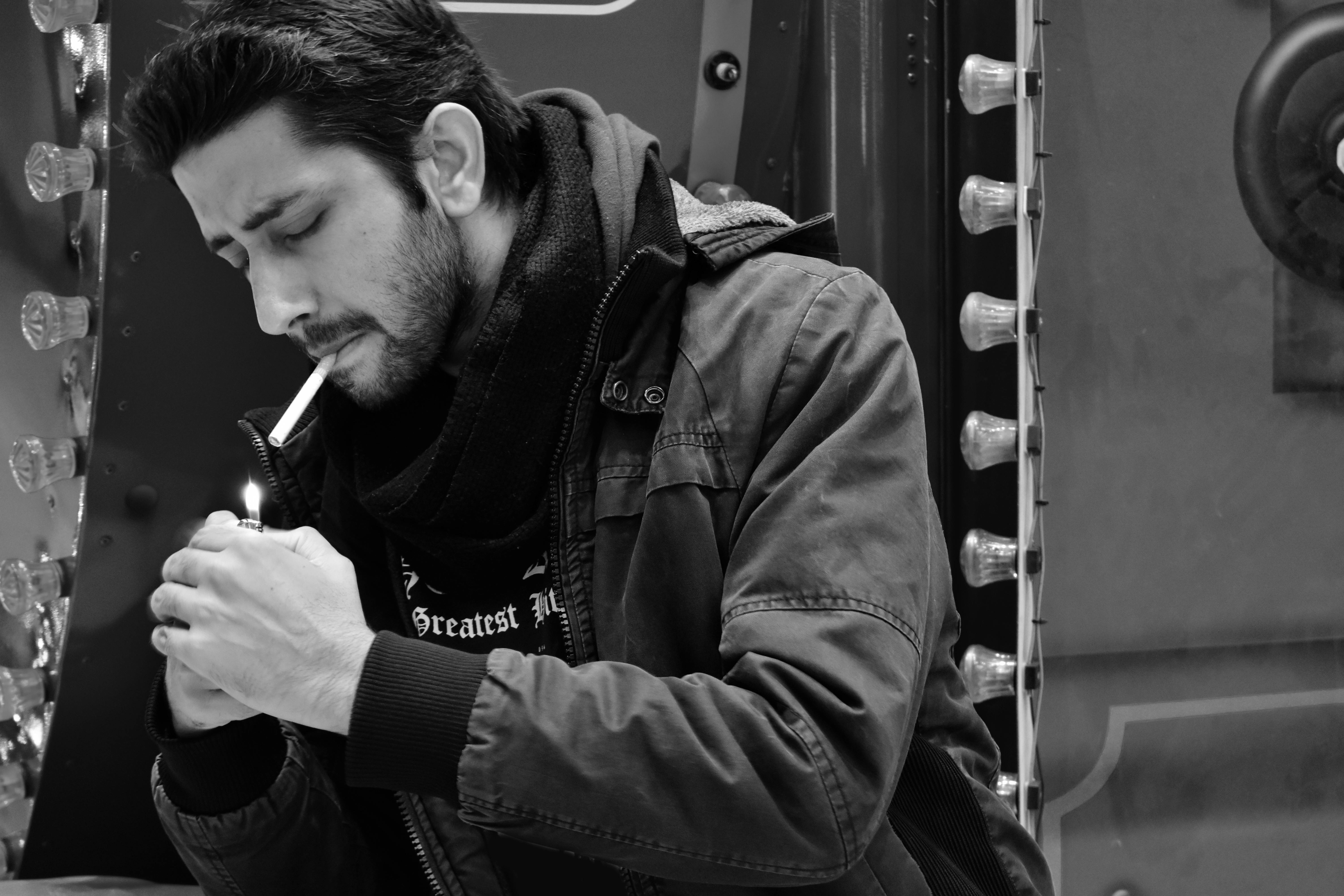 Men Smoking Cigarettes In Black And White Free Stock Photo white-snake-meaning-symbolize-purity-protection-and-also-transformation