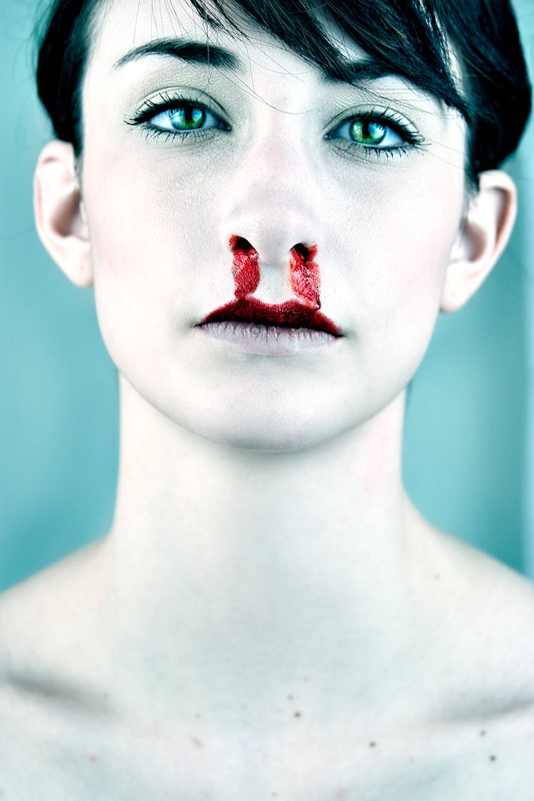 Woman With Bleeding Nose