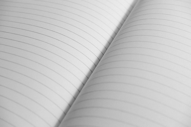 Open ruled notebook — photo by Lighten Up on Pexels