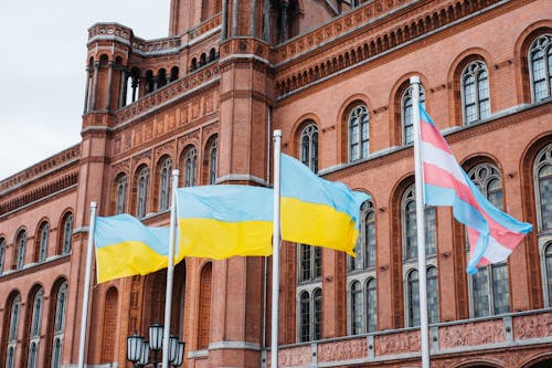 Free Ukrainian Flags Beside Rotes Rathaus in Berlin Stock Photo