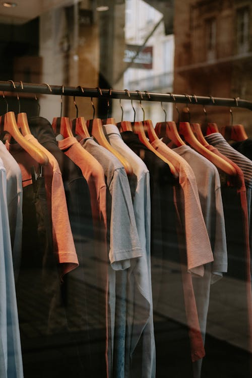 Dakr Clothes on a Clothing Rack in a Store · Free Stock Photo