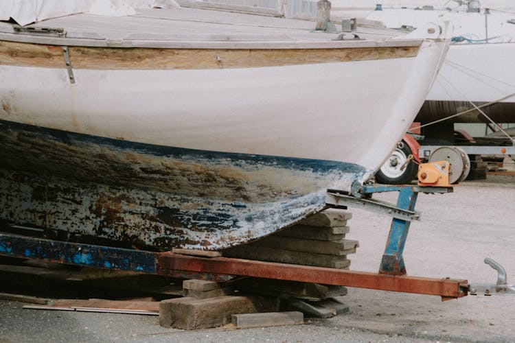 Damaged Boat In Harbor