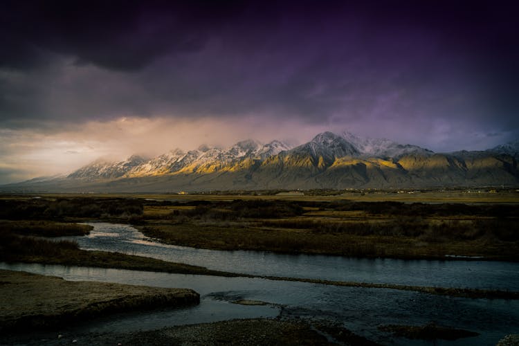 Clouds Over Mountains And Swamps