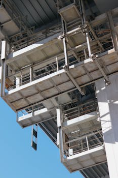 Close-up of a metal scaffolding structure on a building site.