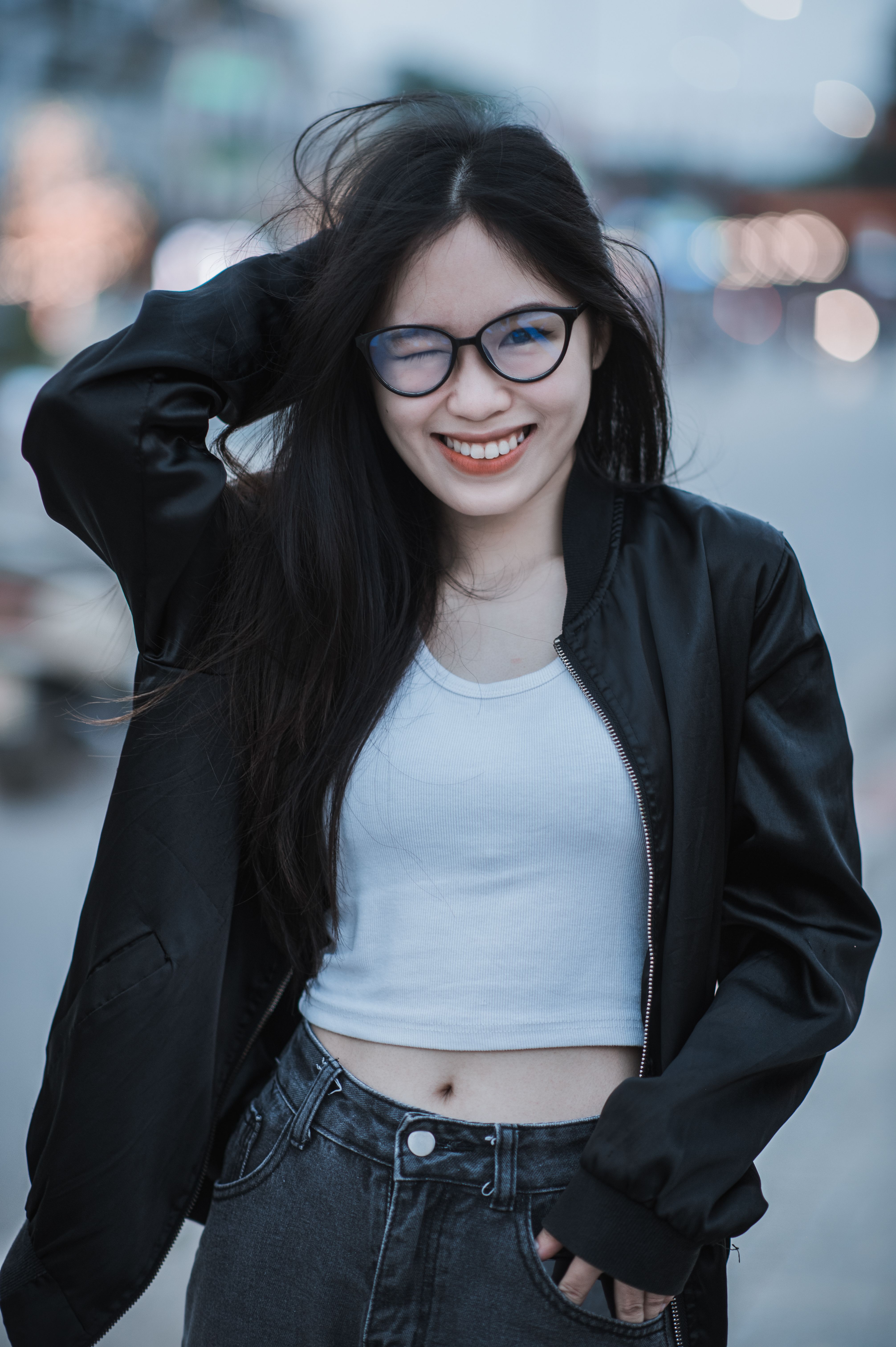 Close-Up Shot of a Woman Wearing a Black Leather Jacket · Free Stock Photo